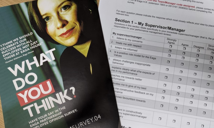 Photo of the printed survey for Eaga and promotional flyer - headline reads What do you think? Have your say in the Eaga Partnership Employee Opinion Survey