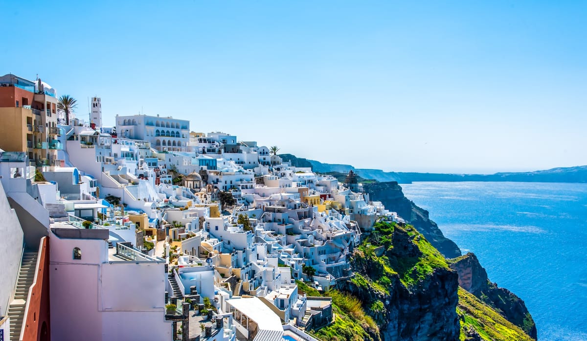 View of Fira town on Santorini. Photo by https://unsplash.com/@isotopon
