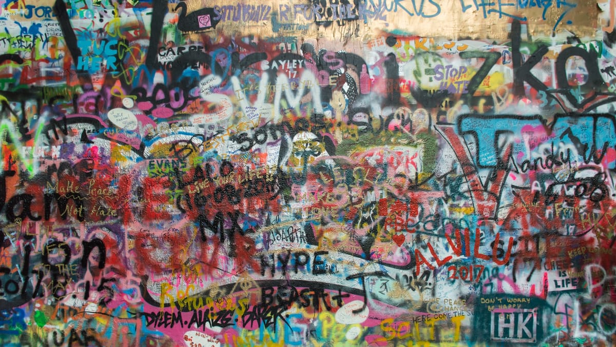 Wall of grafiti - photo by Red Mirror on unSplash.com